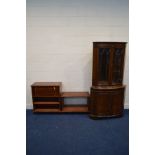 A REPRODUCTION MAHOGANY GLAZED DOUBLE DOOR CORNER CUPBOARD (key) )sd) and two mahogany cabinets (3)