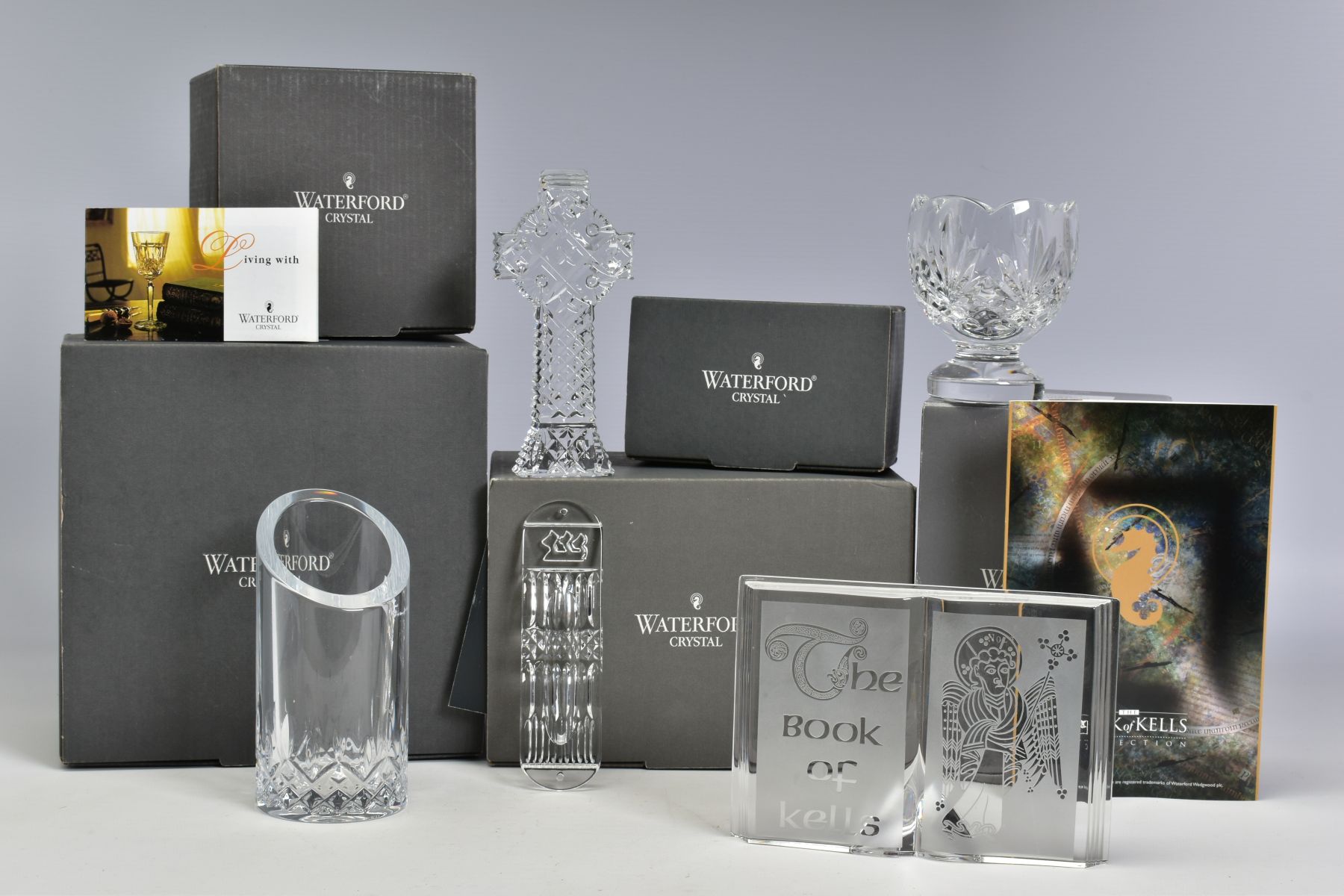 A GROUP OF WATERFORD CRYSTAL, comprising boxed 'Celtic Cross', stamped to base, height 14cm, a boxed