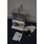 A BROTHER XL-5031 SEWING MACHINE with manual, cover and pedal (PAT pass and working) together with a