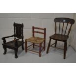 AN EARLY 20TH CENTURY OAK AND BEECH SPINDLE BACK CHILDS CHAIR, together with two other child's
