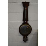 A GEORGIAN ROSEWOOD BANJO BAROMETER, with silvered dial and thermometer plate and a plaque stating