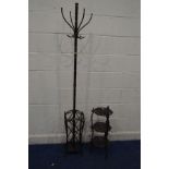 A BLACK CAST IRON THREE TIER STAND, together with a modern metal coat stand (2)
