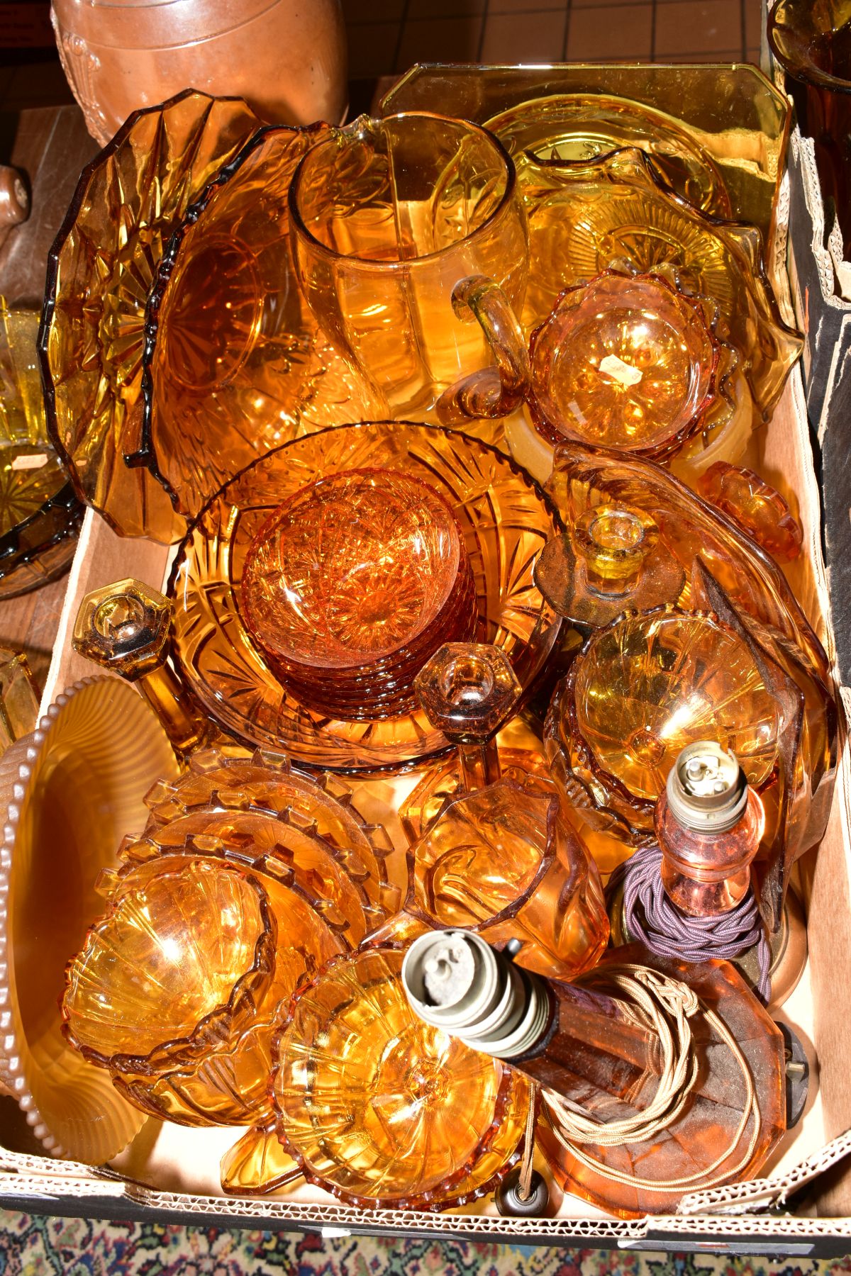 THREE BOXES OF PRESS MOULDED AMBER GLASS to include bowls, storage containers, candlesticks, water - Bild 3 aus 6