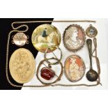 A SELECTION OF ITEMS, to include two gold plated cameo panels one depicting a lady in profile within