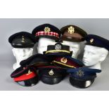 A BOX OF TEN MILITARY CAPS, to include US Army, US Air Force, Russian Army, Royal Scots, RA, Royal