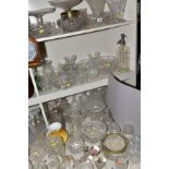 A MISCELLANEOUS COLLECTION OF GLASSWARE, mostly cut glass including bowls, decanters, biscuit