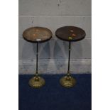 A PAIR OF EARLY TO MID 20TH CENTURY BRASS AND CIRCULAR OAK TOPPED PLANT STANDS, diameter 25cm x