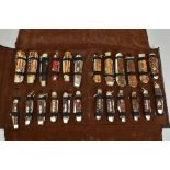 A FOLD OVER CASE CONTAINING A COLLECTION OF PENKNIVES, all mounted and in good condition twenty four