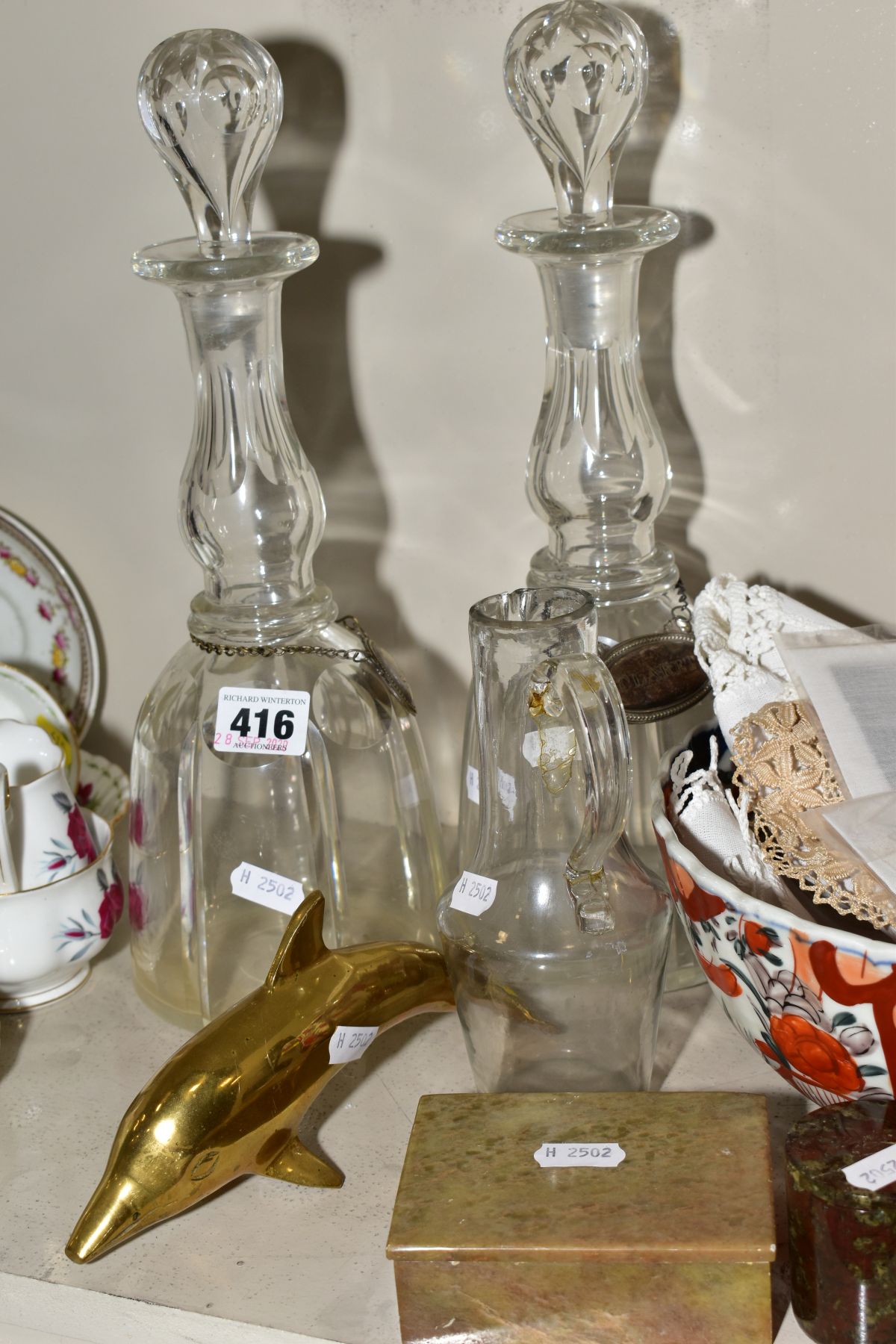 A PAIR OF MALLET SHAPED CUT GLASS DECANTERS, ETC, an Imari bowl, a glass jug, needlework items, - Bild 2 aus 6