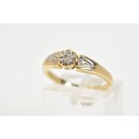 A 9CT GOLD DIAMOND RING, designed with a central illusion set brilliant cut diamond with single