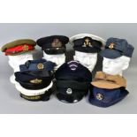 A BOX OF ELEVEN MILITARY CAPS, to include Sandhurst Officers College, HM Submarines, Womens RAF,