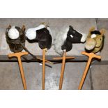 FOUR MERRYTHOUGHT HOBBY HORSES, all appear complete and in fairly good condition, some marking and