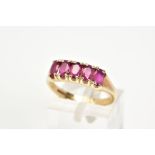 A 9CT GOLD RUBY RING, designed with five oval cut claw set rubies, to a plain polished band,