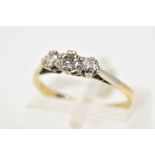 AN EARLY 20TH CENTURY THREE STONE DIAMOND RING, set with three graduated brilliant cut diamonds,
