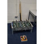 A TABLE TOP FOOTBALL TABLE, together with a box of pool balls and cues (3)
