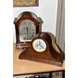 AN EARLY 20TH CENTURY MAHOGANY CASED BRACKET CLOCK, arched top above a foliate engraved silvered