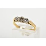 A THREE STONE DIAMOND RING, designed with three graduated round brilliant cut diamonds, openwork