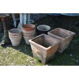 A COLLECTION OF TWELVE GARDEN PLANTERS including two tapered square section terracotta pots 48cm x