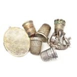 A SELECTION OF ITEMS, to include three silver thimbles, with Chester and Birmingham hallmarks, two
