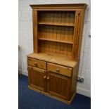 A MODERN PINE DRESSER, with two drawers, width 107cm x depth 43cm