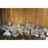 A COLLECTION OF SWAROVSKI CRYSTAL DOG, CAR AND BIRD FIGURES, with a mirrored stand, including Owl,