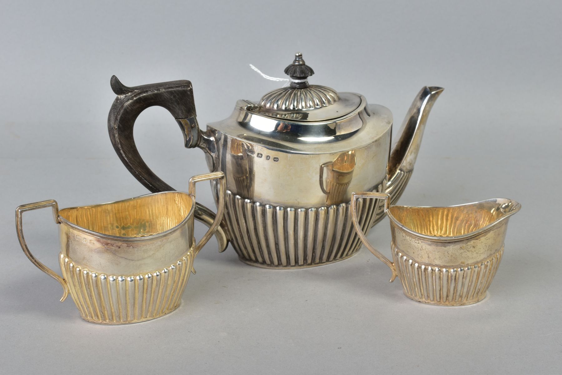 A LATE VICTORIAN SILVER THREE PIECE BACHELORS TEA SET, of oval form, stop reeded decoration, - Image 2 of 4