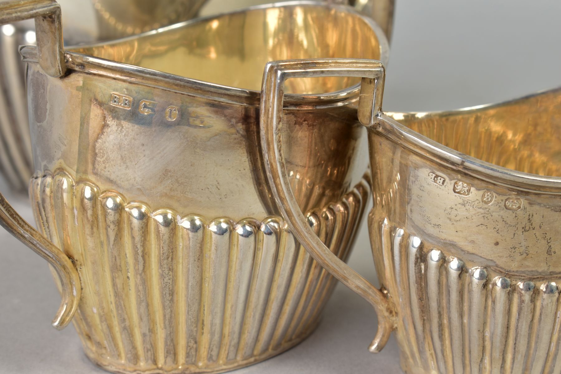 A LATE VICTORIAN SILVER THREE PIECE BACHELORS TEA SET, of oval form, stop reeded decoration, - Image 3 of 4