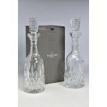 A PAIR OF WATERFORD CRYSTAL LISMORE WINE DECANTERS, one boxed, stamped to side, height with