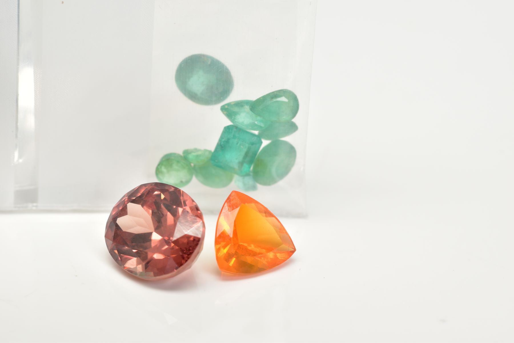 A SELECTION OF LOOSE GEMSTONES, to include a 0.92ct trillion cut fire opal, 7.8 x 7.9 x 4.8mm, a 6. - Image 2 of 3