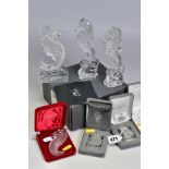 A GROUP OF WATERFORD CRYSTAL SEAHORSES, comprising two boxed 'Seahorse Momento' height 6.5cm, an