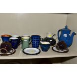 A COLLECTION OF DENBY POTTERY MUGS, TEA POTS, etc, various patterns and glazes, including a coffee