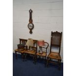 A PAIR OF EDWARDIAN MAHOGANY HALL CHAIRS, together with a carved oak hall chair with a high back (
