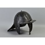 A 17TH CENTURY STYLE 'LOBSTER TAIL' MILITARY HELMET possibly Dutch 'Zischagge', black in colour with