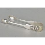 A PAIR OF WILLIAM IV SILVER FIDDLE AND SHELL PATTERN SUGAR TONGS, maker John Walton, Newcastle 1837,