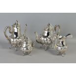 A 20TH CENTURY STERLING SILVER FOUR PIECE TEASET, believed Maltese, of Victorian style with lobed