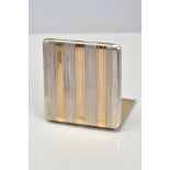A WHITE METAL CARD CASE, the hinged case designed with white and yellow metal engine turn pattern to