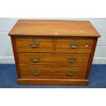 AN EDWARDIAN SATINWOOD CHEST OF TWO SHORT OVER TWO LONG DRAWERS with brass handles and pierced