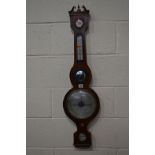 A GEORGIAN ROSEWOOD BANJO BAROMETER, named 'WMTYRER BRIXHAM' on silvered panel, with silvered dials,