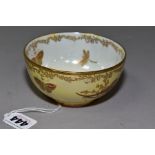 A CROWN DEVON FIELDINGS LUSTERINE BOWL, pale yellow lustre ground printed with butterflies and