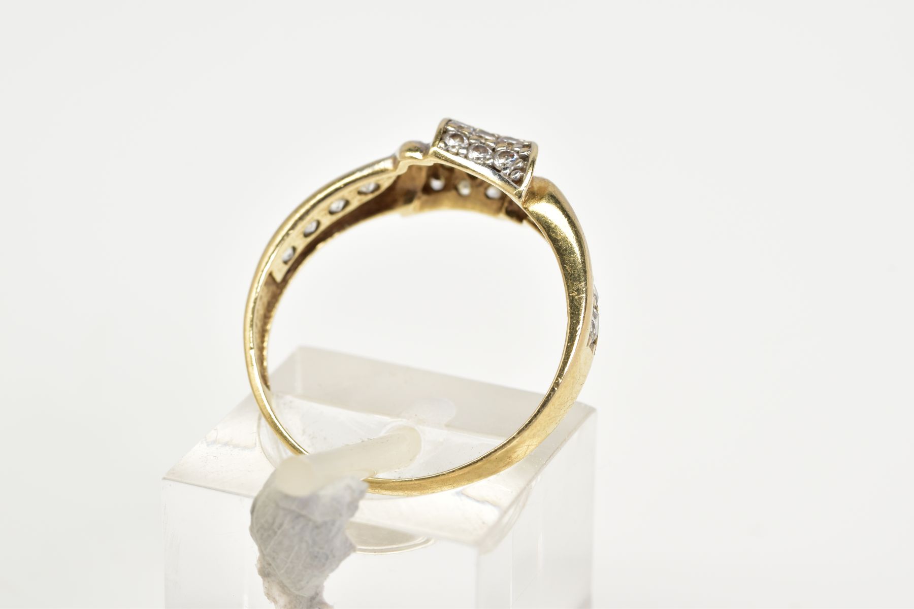 A 9CT GOLD DIAMOND RING, designed with an asymmetrical panel set with round brilliant cut - Image 3 of 3