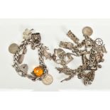TWO SILVER CHARM BRACELETS, the first silver bracelet suspending seven white metal charms, such as a