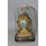 A LATE 19TH CENTURY ORMOLU MANTEL CLOCK WITH PORCELAIN DIAL AND PLAQUE, Roman numerals to dial,