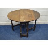 A SMALL GEORGIAN OAK OVAL TOPPED GATE LEG TABLE, on turned and block legs, open length 95cm x closed