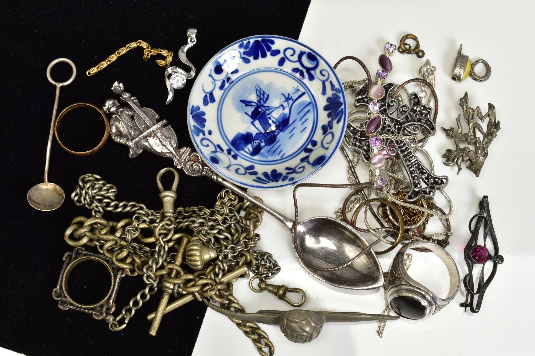 A SELECTION OF ITEMS, to include a Bernard Muller silver teaspoon with a Cello player to the handle,