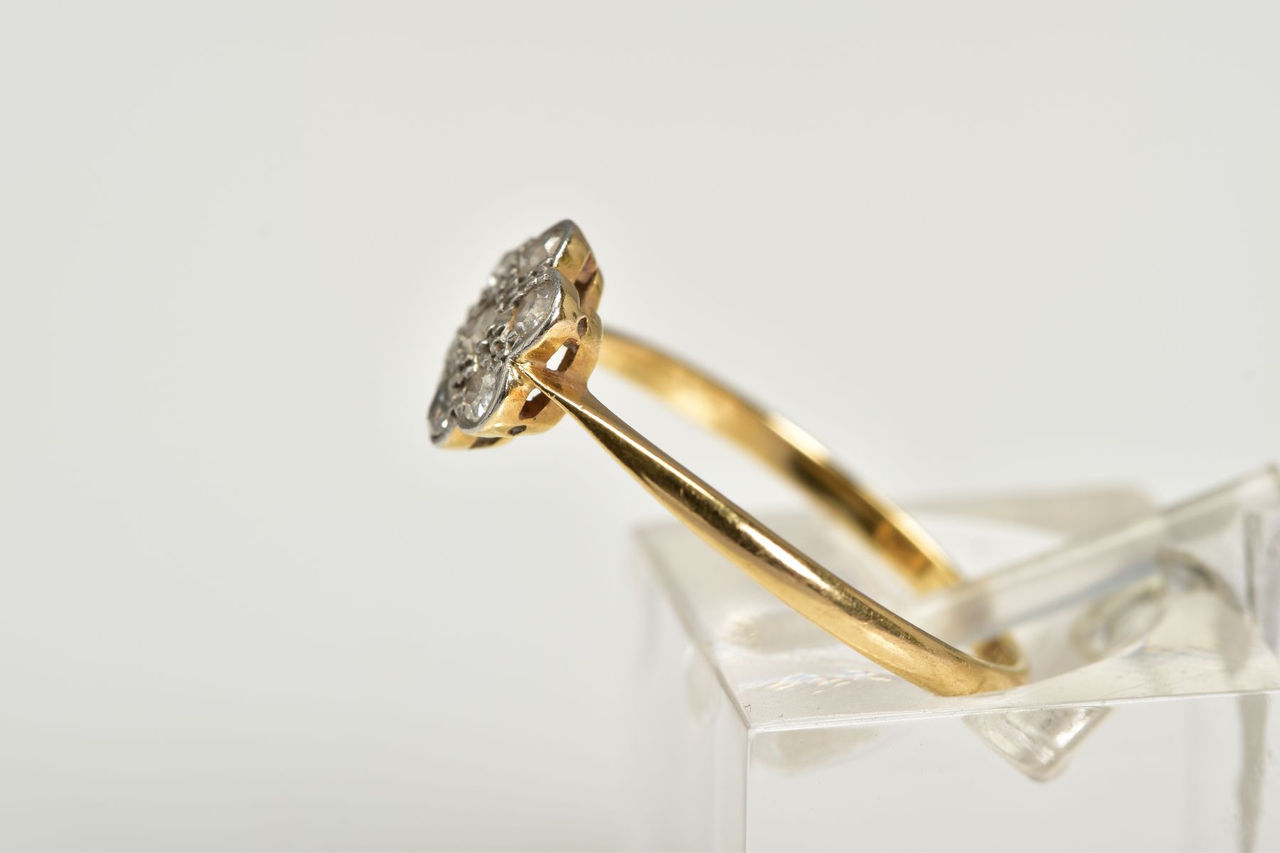 A DIAMOND CLUSTER RING, the yellow metal ring designed with a flower cluster set with single cut - Image 2 of 3