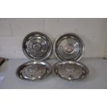 A SET OF FOUR BENTLEY AUTOMOBILE CHROMED HUB CAPS, diameter 43cm