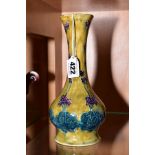 A S.HANCOCK & SONS MORRISWARE BALUSTER VASE, mottled green ground, tube lined with purple flowers on