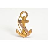 A YELLOW METAL VICTORIAN BROOCH, in the form of an anchor and rope with engraved scroll 'H.M.S.