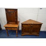 A REPRODUCTION OAK TWO DOOR CORNER CUPBOARD, width 95cm x depth 47cm x height 76cm and a matching