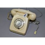 A B.T. MODEL 8746G TELEPHONE, in ivory some fading to case and minor damage to handset, with a